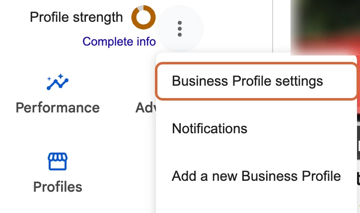The three-dot menu on the Your business on Google panel opened, with Business Profile settings highlighted